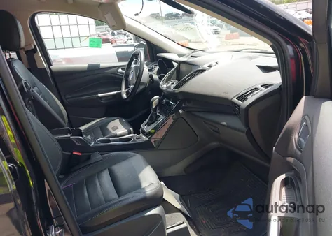 2014 Ford Escape Titanium z USA, uszkodzony, nr VIN 1FMCU9J96EUA26469